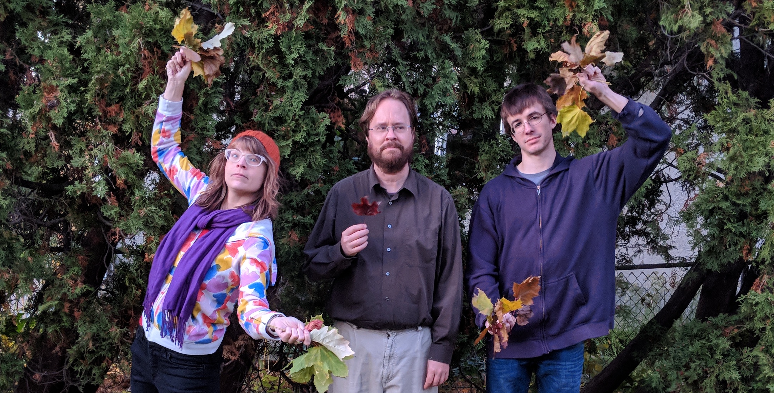 Gurayn and me and Will standing around holding leaves.